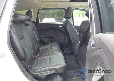 2016 Ford Escape Titanium z USA, uszkodzony, nr VIN 1FMCU9J98GUA00832